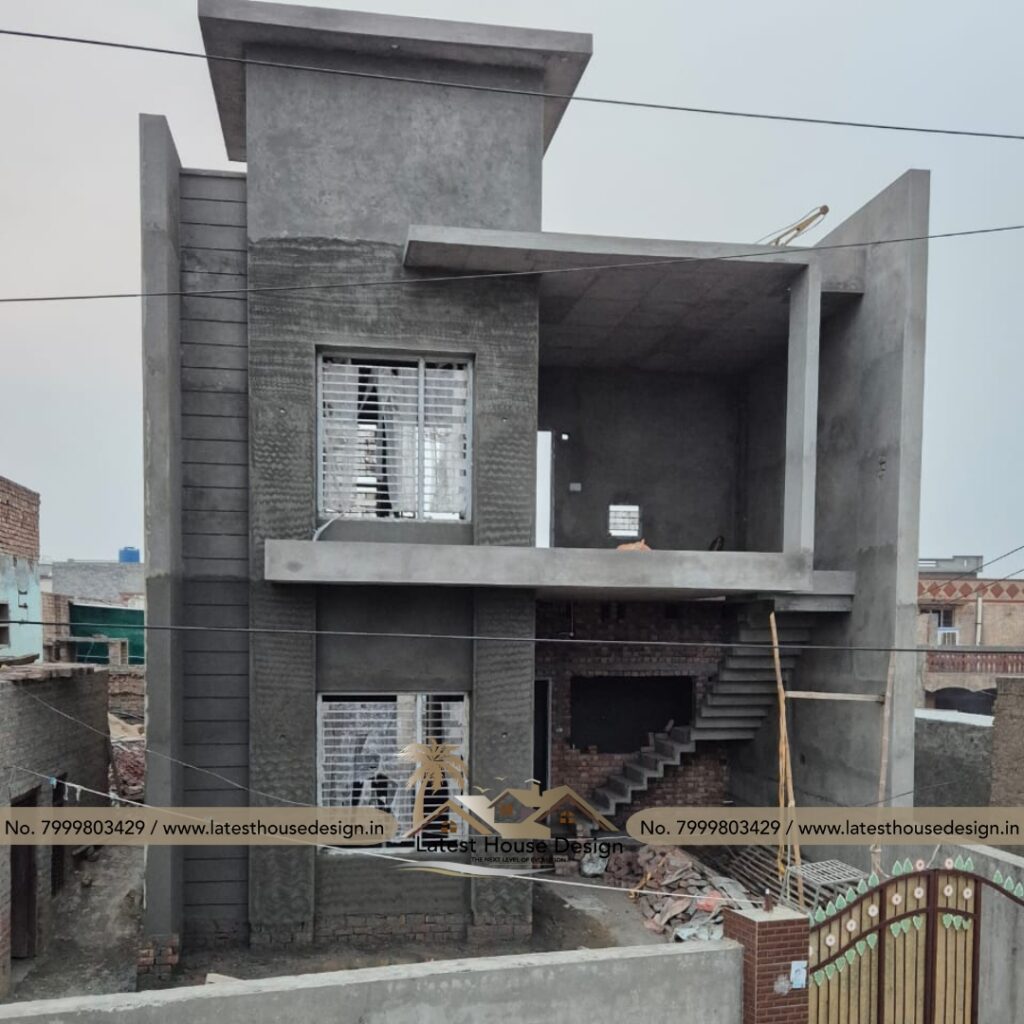 Real under-construction house perfectly matching the 3D elevation design with visible structural details.